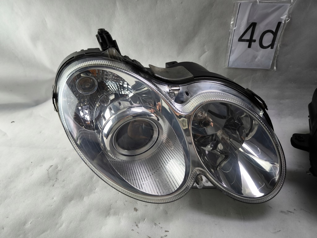 MERCEDES CLK 209 LIFT W209 XENON TURNING LINKS RECHTS SCHEINWERFERLAMPE Product image