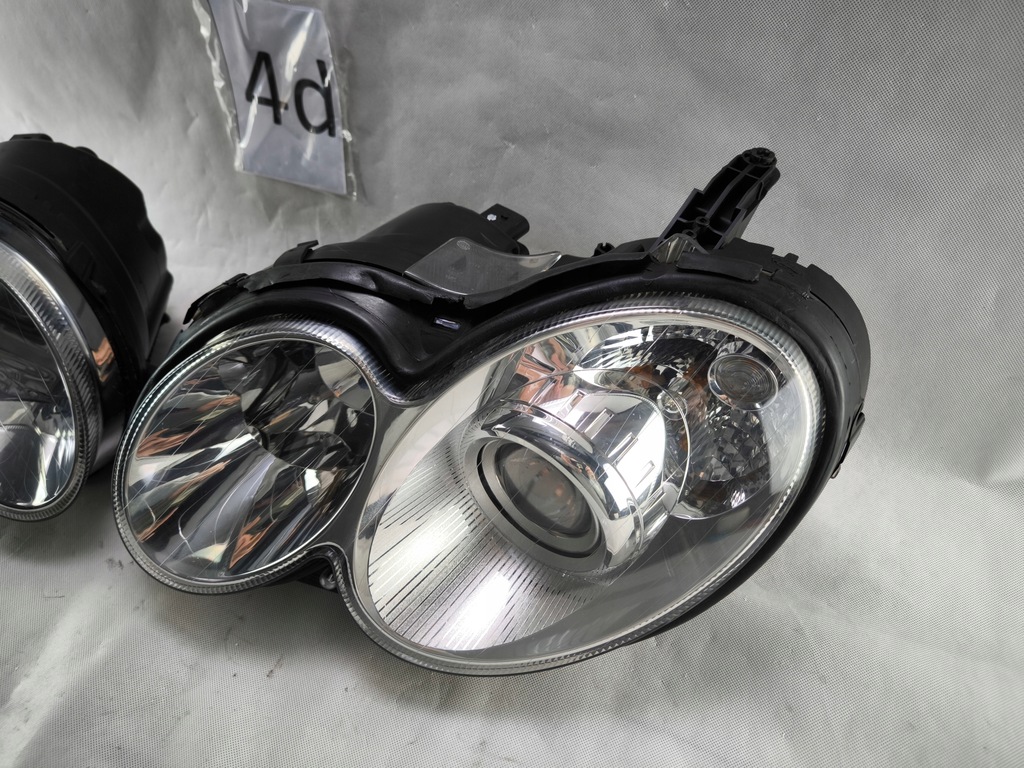 MERCEDES CLK 209 LIFT W209 XENON TURNING LINKS RECHTS SCHEINWERFERLAMPE Product image