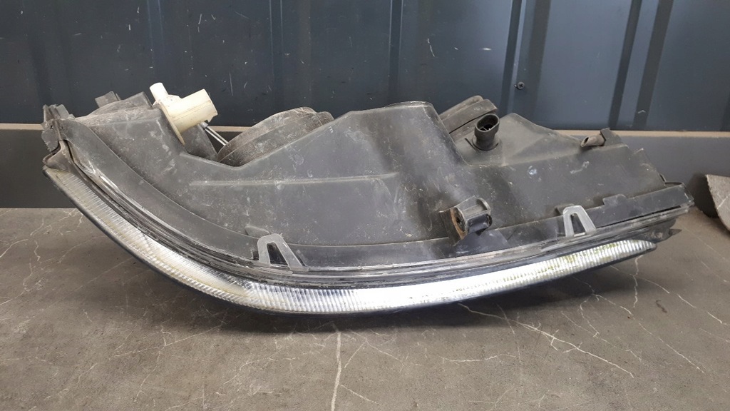 90520877 Lewy Scheinwerfer Opel Astra II G Hella Product image