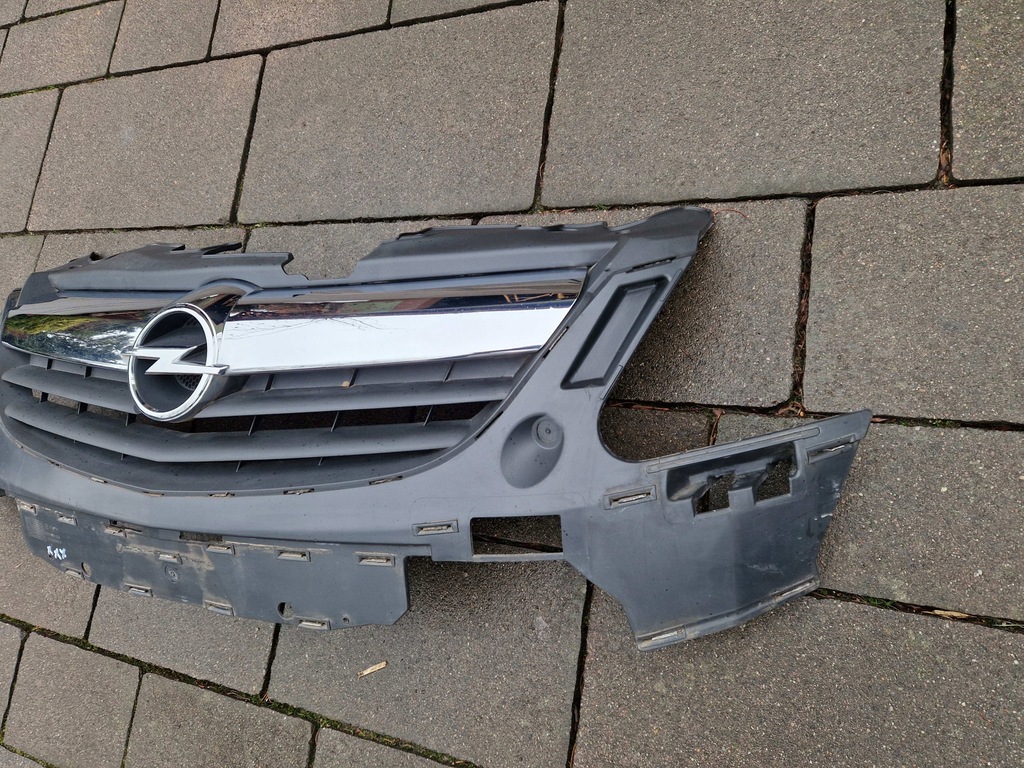 Opel Corsa D Vor dem Aufheben der vorderen Stoßfänger Dummy Chrom 13179940 06-2011 Product image